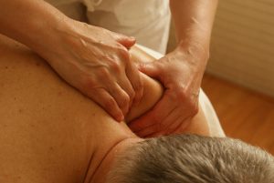 True Motion Sports Massage showing shoulder massage