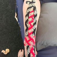 True Motion Sports Massage showing kinesio taping